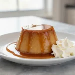 Gordon Ramsay's sticky toffee pudding served warm with a rich toffee sauce.